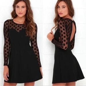 Lulu’s black polka dot cocktail length dress